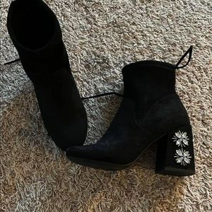 Boots.  Suede like jeweled heel